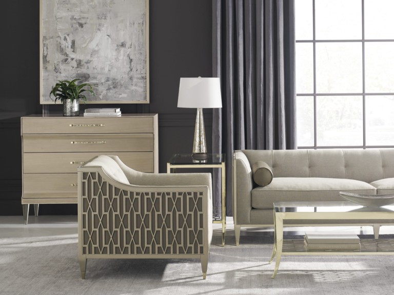 *AVAILABLE IN CARACOLE COUTURE CUSTOM UPHOLSTERY PROGRAM* Chair-ish builds on the company's tradition of hand-carved lattice barrel frames with gracefully tapered legs. A retro-modern geometric honeycomb pattern has been rendered in a shimmering Taupe Paint and paired with linen