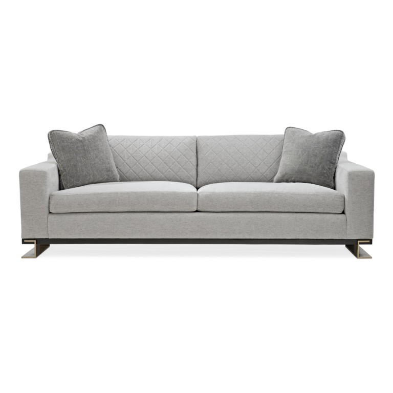 It's impossible not to fall in love with the grand presence and over-the-top character of this bold sofa. With wide track arms that provide a frame around its clean-lined silhouette