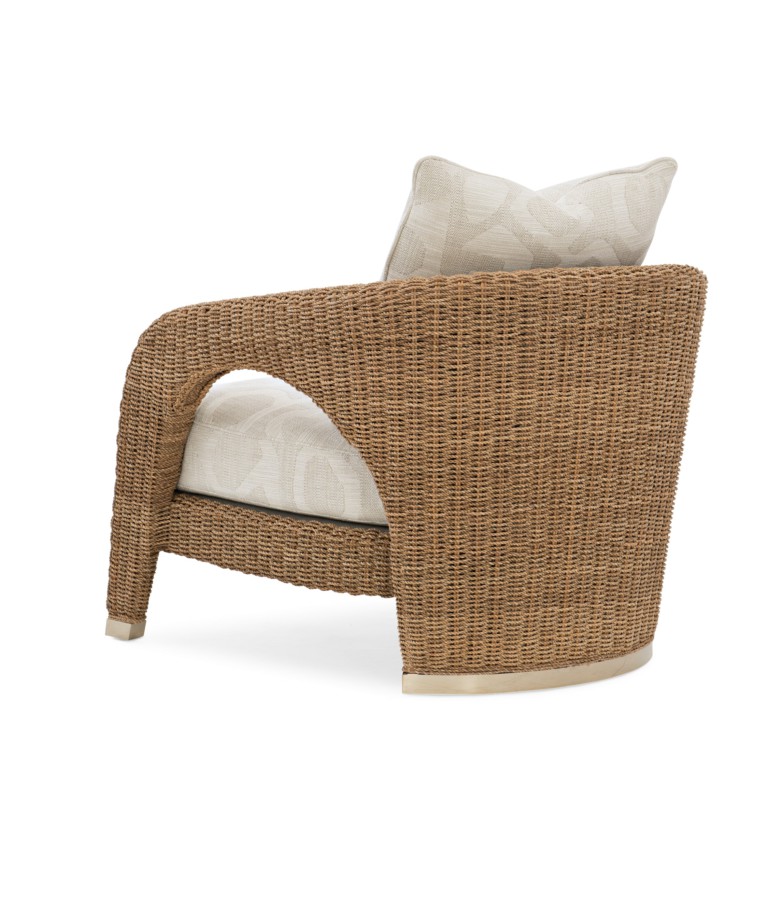 Nothing says modern coastal more than the textured appeal of woven seating. This charming barrel chair with its woven rope construction brings the beauty of nature to the indoors and adds a sense of calm. Boasting a refined organic vibe
